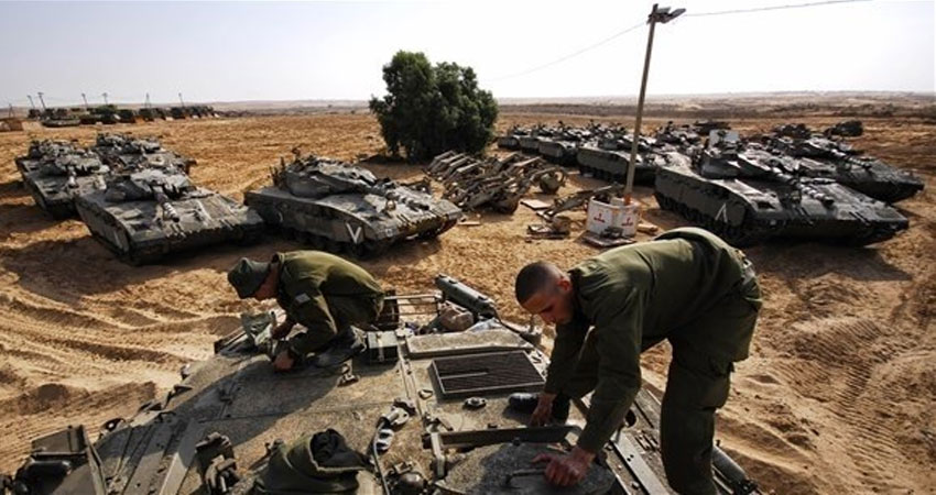 إسرائيل تحشد جيشها على حدود قطاع غزة