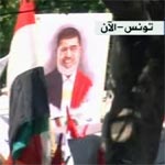 Des photos géantes de Mohamed Morsi à l'avenue