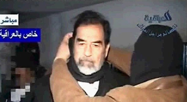 متى تم توقيع مذكرة إعدام صدام حسين؟